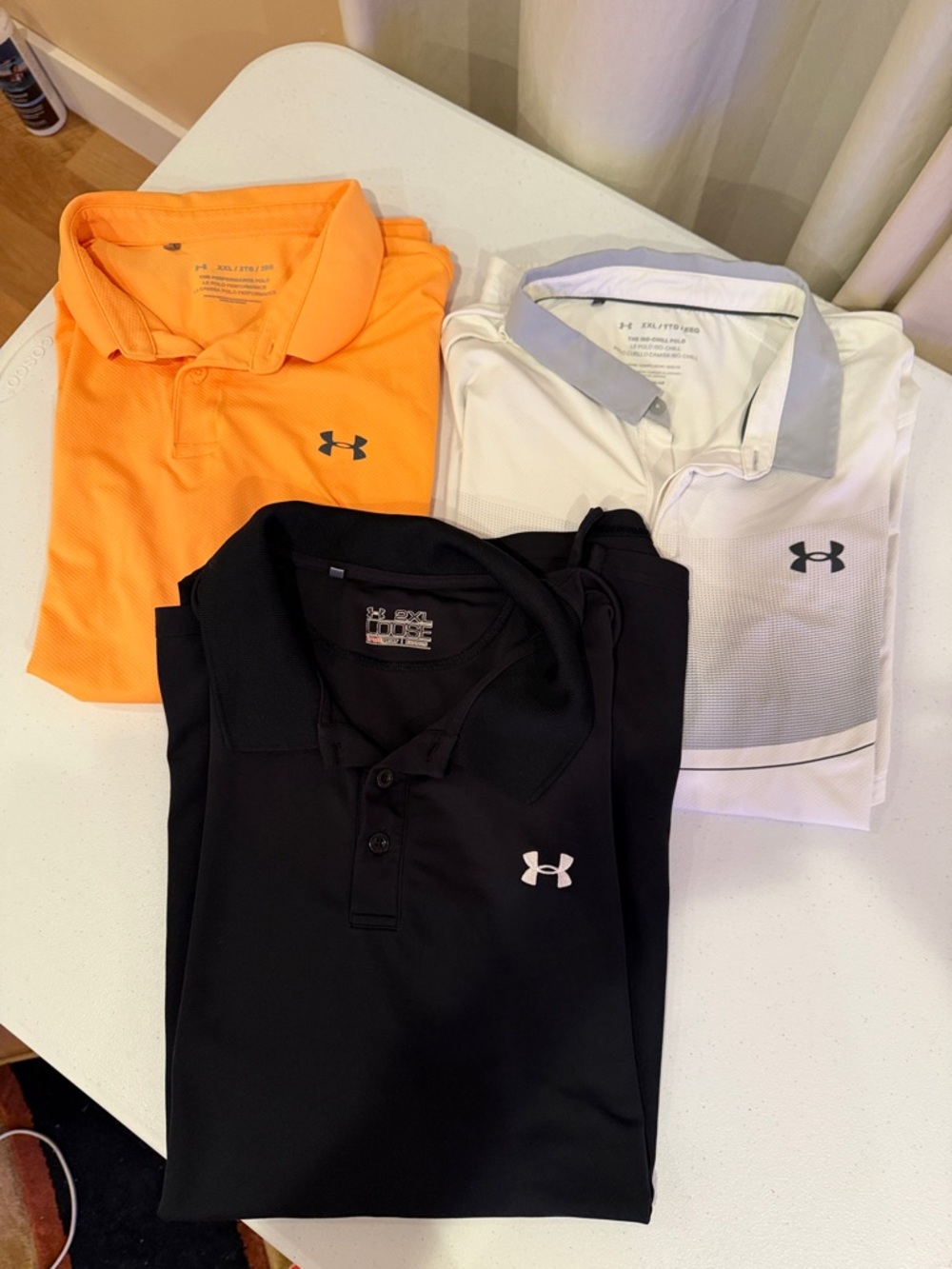 Under Armour Polo Trio - Orange, White & Black Bundle of 3